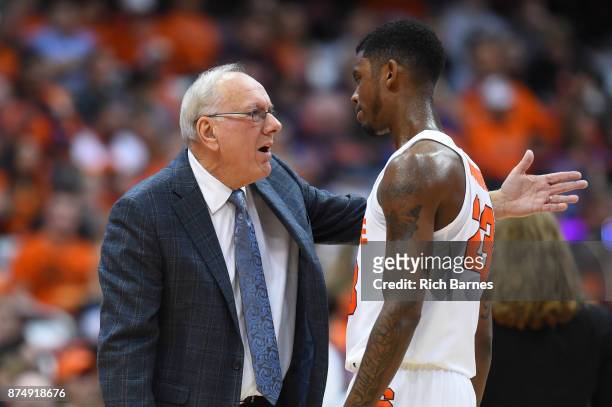 Head coach Jim Boeheim of the Syracuse Orange reacts to a play while talking with Frank Howard against the Iona Gaels during the second half at the...