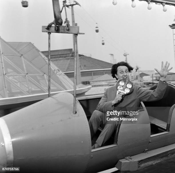Ken Dodd, appearing in 'The Big Show of 1964' at the Blackpool Opera House, visits the Pleasure Beach. Ken is really trying to lick The Beatles as...