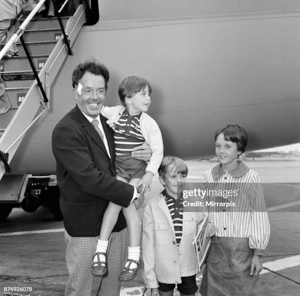 Actor Brian Rix arrives at LAP with his children after his accident in Spain, 10th September 1965.