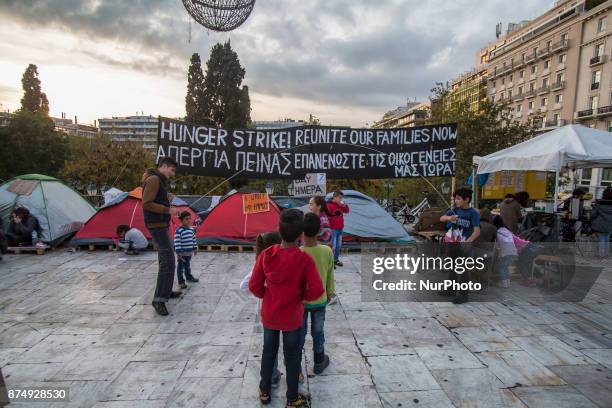 Syrian refugees are protesting for almost 2 weeks with a hunger strike and staying in tents in front of the Hellenic parlianment in Athens, Greece,...