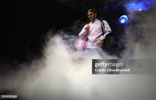 Roger Federer of Switzerland gets ready to walk out on court for his third round robin match against Marin Cilic of Croatia during the Nitto ATP...