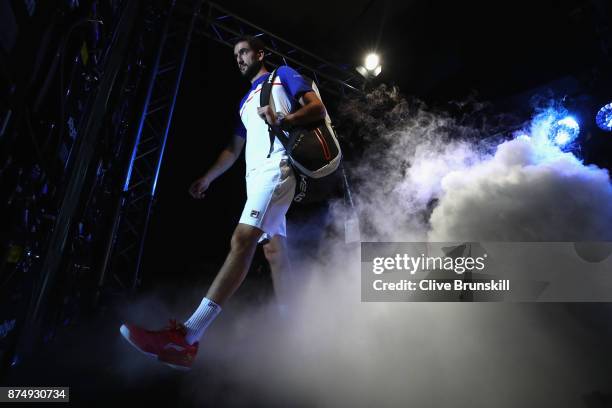 Marin Cilic of Croatia walks out on court for his third and final round robin match against Roger Federer of Switzerland during the Nitto ATP World...