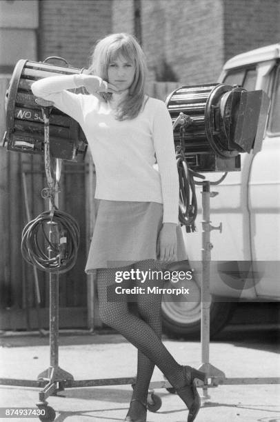 Actress Susan George, pictured on the film set during a filming break in Tooting High Street, London. She is filming at a pub called The Castle....