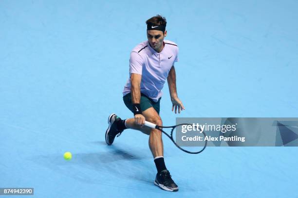 Roger Federer of Switzerland plays a backhand during the singles match against Marin Cilic of Croatia on day five of the 2017 Nitto ATP World Tour...