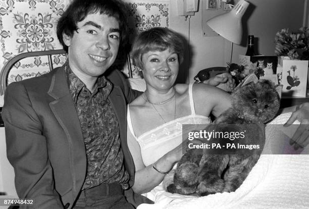 Andrew Lloyd Webber alongside actress Judi Dench recovering in the Fitzroy Nuffield Hospital, London, after an operation on her achilles tendon,...
