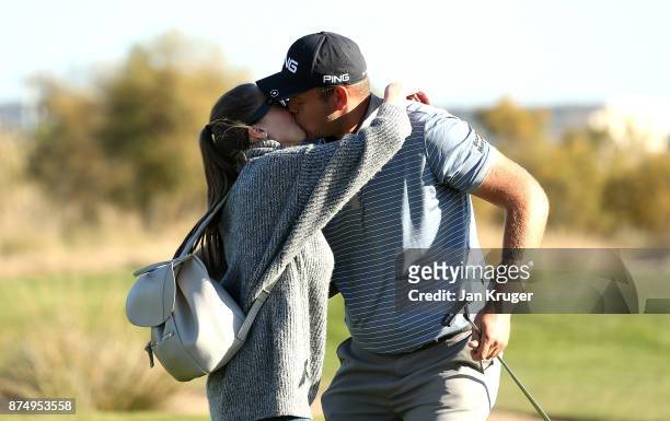 Jonathan Thomson of England is congratulated by his girlfriend after earning his card during the final round of the European Tour Qualifying School...