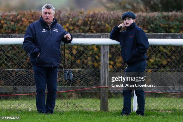 Trainer Paul Nicholls with his assistant trainer Harry Derham at Taunton racecourse on November 16, 2017 in Taunton, United Kingdom.