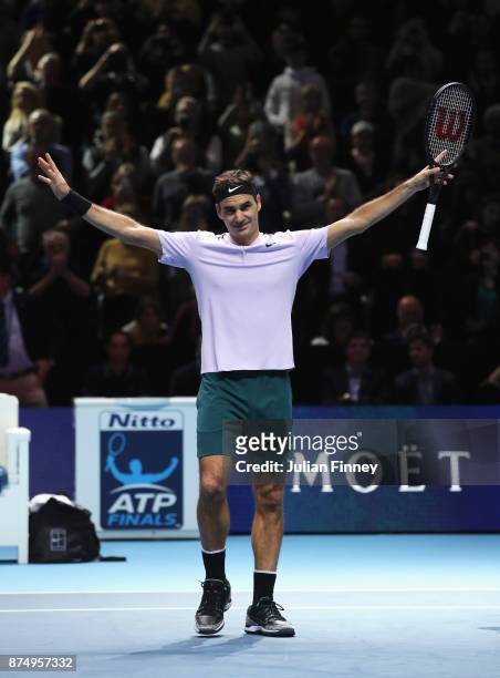 Roger Federer of Switzerland celebrates victory in his Singles match against Marin Cilic of Croatia during day five of the Nitto ATP World Tour...