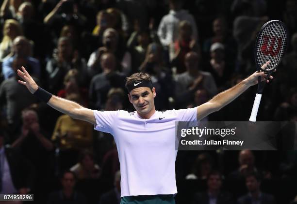 Roger Federer of Switzerland celebrates victory in his Singles match against Marin Cilic of Croatia during day five of the Nitto ATP World Tour...