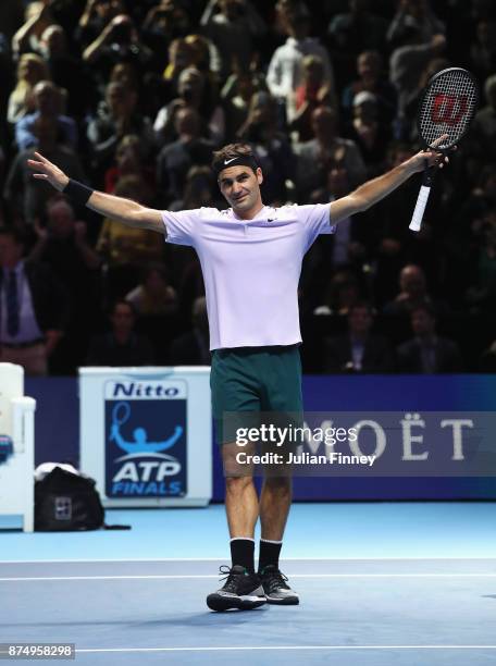 Roger Federer of Switzerland celebrates victory in his Singles match against Marin Cilic of Croatia during day five of the Nitto ATP World Tour...