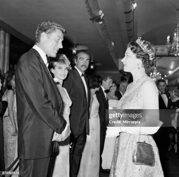 Queen Elizabeth II meets Dick Van Dyke at the premiere of 'You Only Live Twice', 12th June 1967.