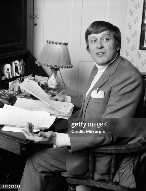 Jimmy Perry, Scriptwriter, pictured working on Dads Army scripts, at home in Westminster, London, 9th April 1969.