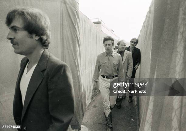 American singer, songwriter and guitarist Joe Ely during a backstage concert in 1981. He has had a genre-crossing career, performing with Bruce...