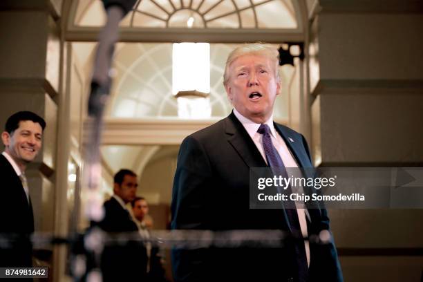 President Donald Trump speaks briefly to journalists after leaving a House Republican conference meeting at the U.S. Capitol November 16, 2017 in...