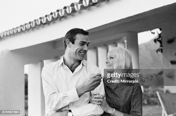 Actor Sean Connery who plays James Bond, pictured with his new bride, actress Diane Cilento on their honeymoon near Marbella in Southern Spain,...