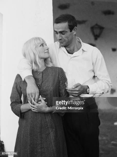 Actor Sean Connery who plays James Bond, pictured with his new bride, actress Diane Cilento on their honeymoon near Marbella in Southern Spain,...