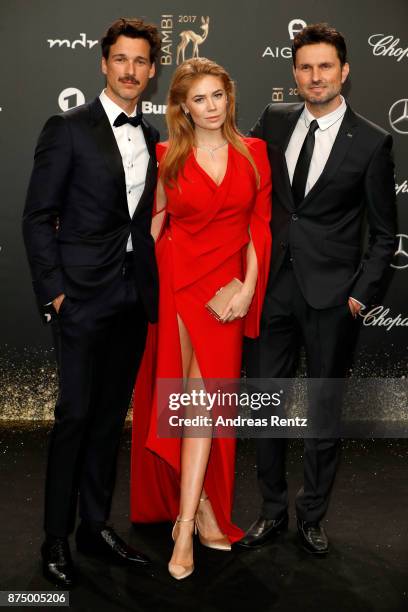 Florian David Fitz, Palina Rojinski and Simon Verhoeven arrive at the Bambi Awards 2017 at Stage Theater on November 16, 2017 in Berlin, Germany.