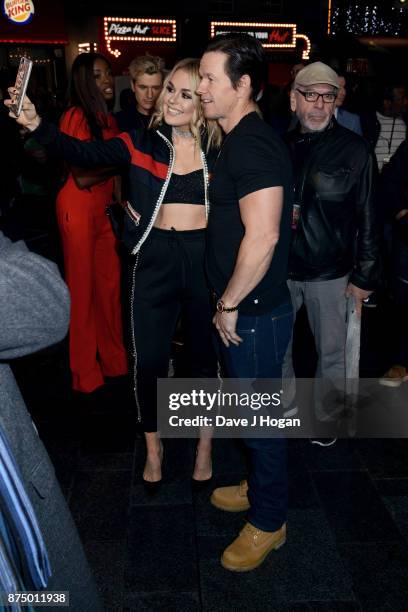 Tallia Storm and Mark Wahlberg arrive at the UK Premiere of 'Daddy's Home 2' at Vue West End on November 16, 2017 in London, England.