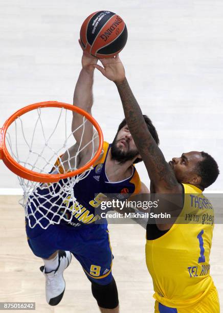 Stefan Markovic, #9 of Khimki Moscow Region competes with Deshaun Thomas, #1 of Maccabi Fox Tel Aviv in action during the 2017/2018 Turkish Airlines...