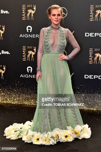 German actress Alicia von Rittberg poses on the red carpet upon her arrival for the 2017 BAMBI awards ceremony on November 16, 2017 at the Stage...