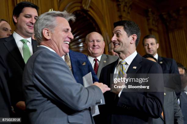 House Speaker Paul Ryan, a Republican from Wisconsin, right, speaks as House Majority Leader Kevin McCarthy, a Republican from California, left,...