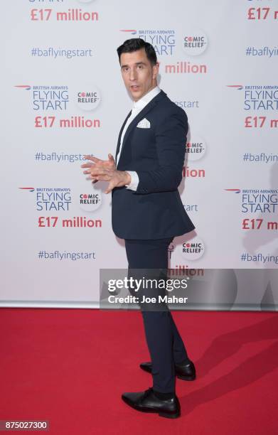 Russell Kane attends a British Airways event celebrating the airline raising GBP17 million for Comic Relief through its Flying Start Partnership at...