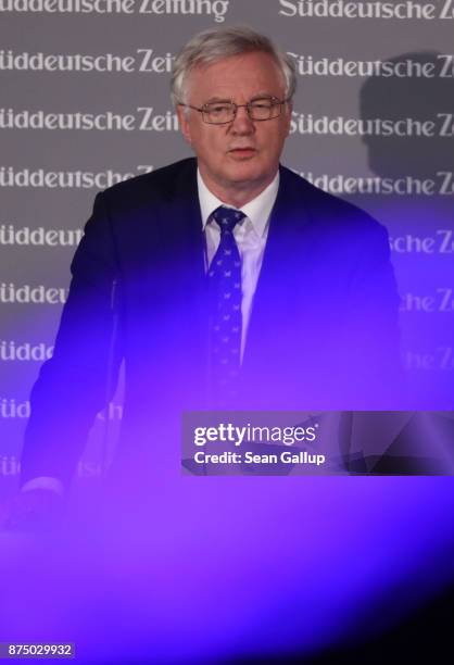 David Davis, British Secretary of State for Exiting the European Union, speaks behind an LED coloured light at the Sueddeutsche Zeitung Economic...