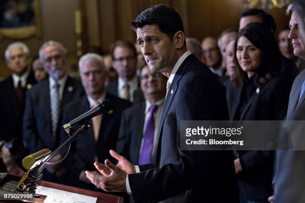 House Speaker Paul Ryan, a Republican from Wisconsin, speaks during a news conference with House Republican members after voting on the Tax Cuts and...