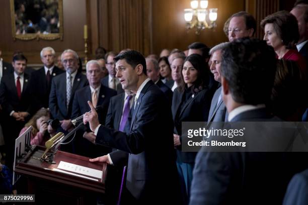House Speaker Paul Ryan, a Republican from Wisconsin, speaks during a news conference with House Republican members after voting on the Tax Cuts and...