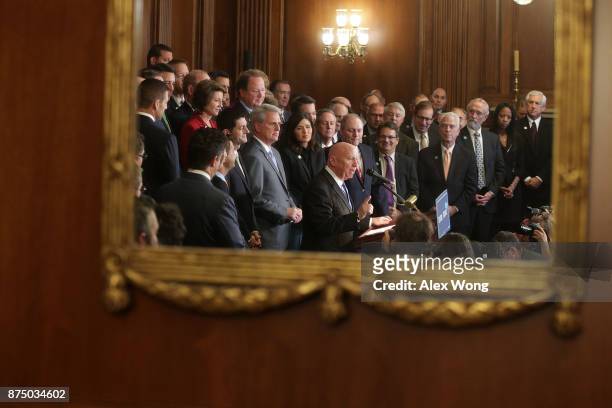 Reflected on a mirror, U.S. House Ways and Means Committee Chairman Rep. Kevin Brady speaks as other House Republicans, including Speaker of the...
