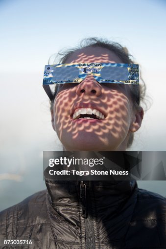 Solar Eclipse moon shadows on face Solar Eclipse moon shadows on face