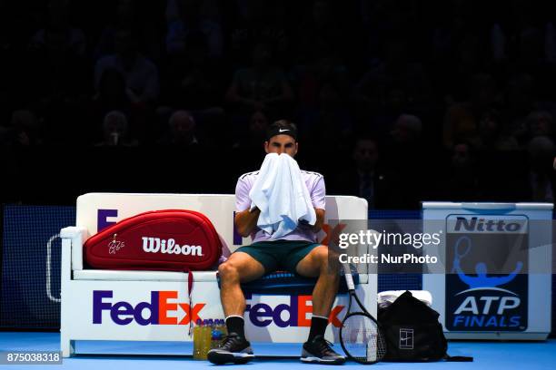 Switzerland's Roger Federer takes a break during the men's singles round-robin match with Croatia's Marin Cilic on day five of the ATP World Tour...