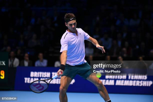 Switzerland's Roger Federer returns to Croatia's Marin Cilic during their men's singles round-robin match on day five of the ATP World Tour Finals...