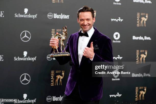 Hugh Jackman poses with his award at the Bambi Awards 2017 winners board at Stage Theater on November 16, 2017 in Berlin, Germany.