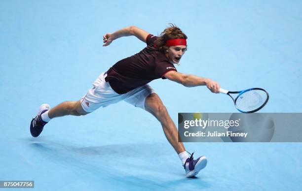 Alexander Zverev of Germany plays a backhand in his Singles match against Jack Sock of the United States during day five of the Nitto ATP World Tour...