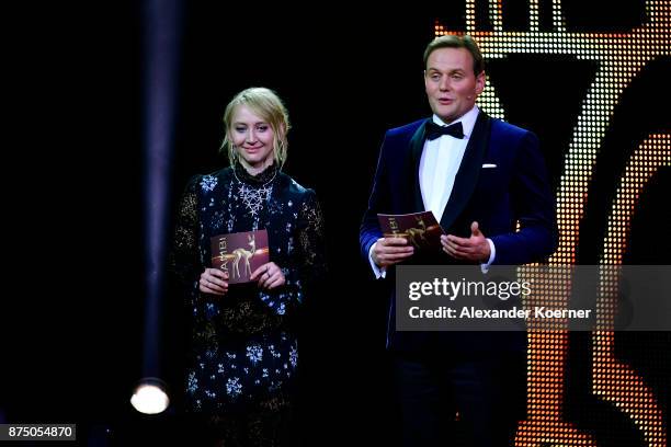 Anna Maria Muehe and Devid Striesow are seen on stage during the Bambi Awards 2017 show at Stage Theater on November 16, 2017 in Berlin, Germany.