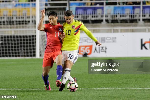 Lee Keun Ho of South Korea and James Rodriguez of Colombia in action during an KEB HANA BANK Invitational Friendly Match South Korea v Colombia at...