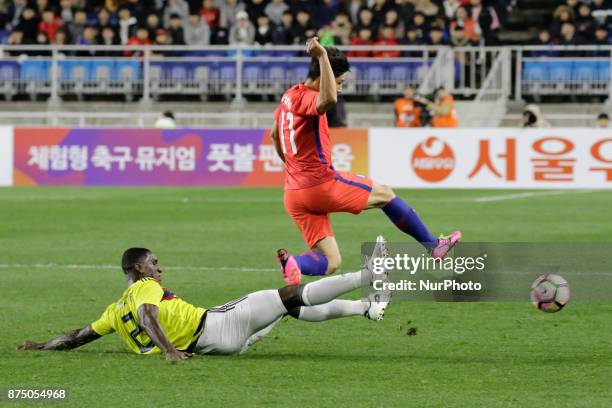 Lee Keun Ho of South Korea and Cristian Zapata of Colombia in action during an KEB HANA BANK Invitational Friendly Match South Korea v Colombia at...