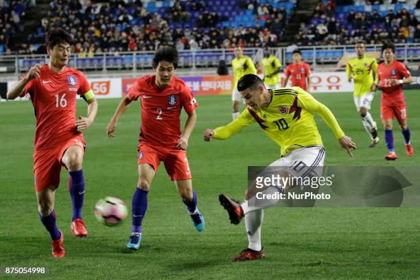 Choi Chul Soo of South Korea and James Rodriguez of Colombia in action during an KEB HANA BANK Invitational Friendly Match South Korea v Colombia at...