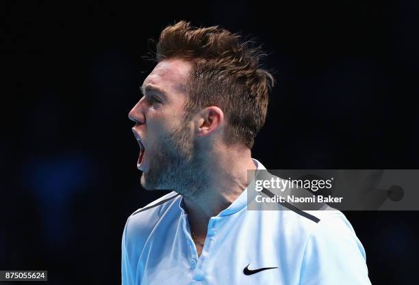 Jack Sock of the United States celebrates a point in his Singles match against Alexander Zverev of Germany during day five of the Nitto ATP World...