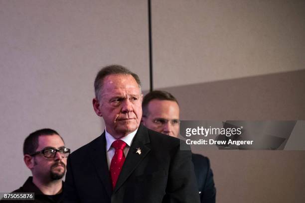 Republican candidate for U.S. Senate Judge Roy Moore listens to a question during a news conference with supporters and faith leaders, November 16,...