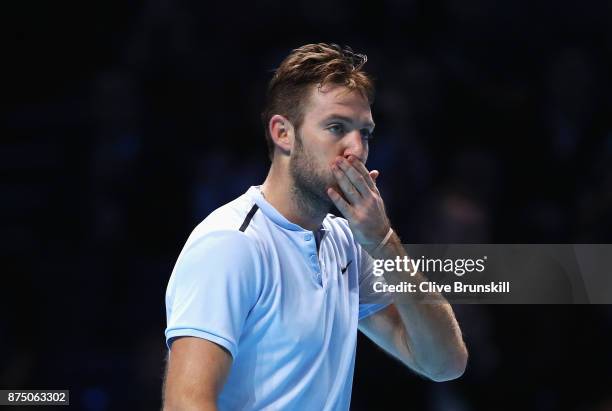 Jack Sock of the United States celebrates victory in his Singles match against Alexander Zverev of Germany during day five of the Nitto ATP World...