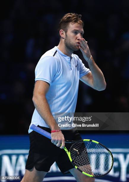 Jack Sock of the United States celebrates victory in his Singles match against Alexander Zverev of Germany during day five of the Nitto ATP World...