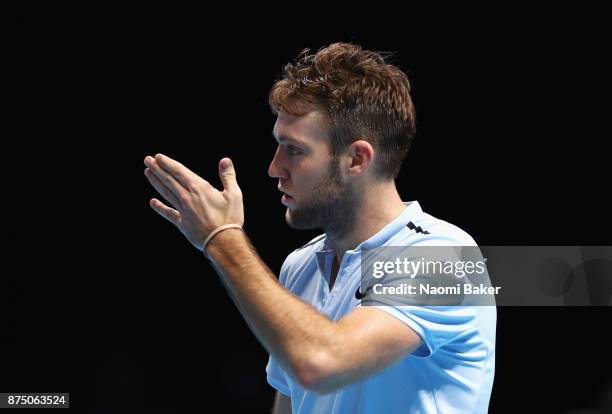 Jack Sock of the United States celebrates victory in his Singles match against Alexander Zverev of Germany during day five of the Nitto ATP World...