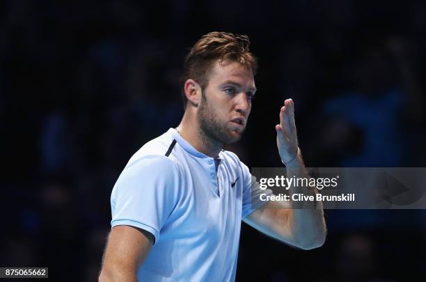 Jack Sock of the United States celebrates victory in his Singles match against Alexander Zverev of Germany during day five of the Nitto ATP World...