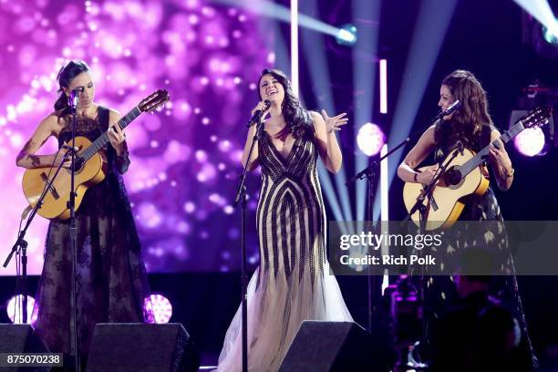 Marta Robles, Alba Carmona and Alicia Grillo of Las Migas perform onstage at the Premiere Ceremony during the 18th Annual Latin Grammy Awards at the...