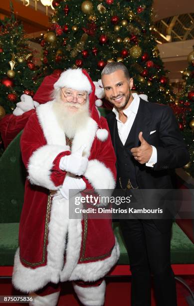 Jay Manuel takes a photo with Santa Claus during Jay Manuel Beauty, Grand Opening at Roosevelt Field Mall on November 16, 2017 in Garden City City.