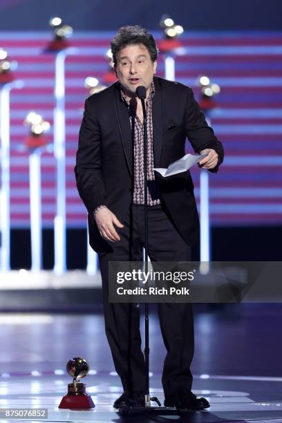 Andres Calamaro accepts Best Rock Song for 'La Noche' onstage at the Premiere Ceremony during the 18th Annual Latin Grammy Awards at the Mandalay Bay...