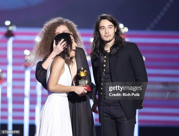 Ana Caetano, Vitoria Falcao and Tiago Iorc accept Best Song in the Portuguese Language for 'Trevo ' onstage at the Premiere Ceremony during the 18th...