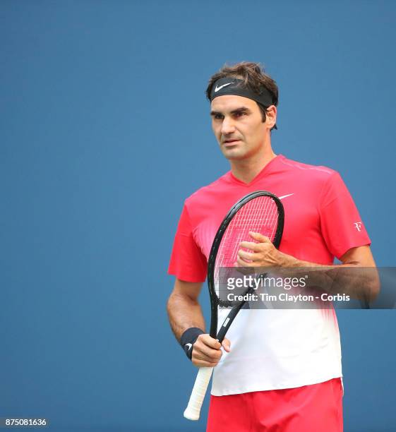 Open Tennis Tournament - DAY FOUR. Roger Federer of Switzerland in action against Mikhail Youzhny of Russia during the Men's Singles round two match...